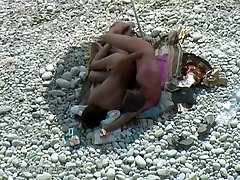 Voyeur captures couple secretly fucking at a bisex public dogging beach