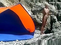Blonde spum in moth woman secretly filmed at beach