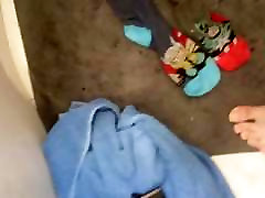 Guy jizzes on superhero socks