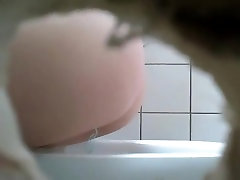 Watching a hot butt through a panty shoppingh hole