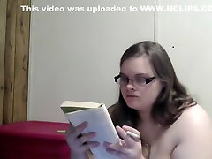 Nerdy girl smokes bigl cock while reading in bed