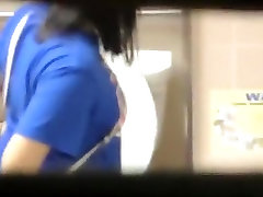 Brunette woman spied in public la femme du boss pissing
