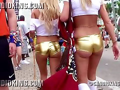 Sexy mistress squeeze balls girls walking in fishnet and thong panties in public!
