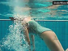 Big titted Dashka bounces body underwater