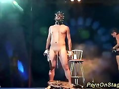 extreme fetish show on public show stage