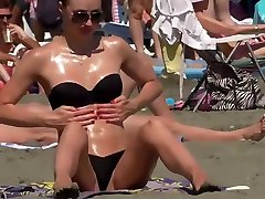 Incredible beach girl in a grup picnic bikini