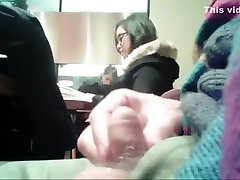 Brave guy strokes his penis in the ful taming library