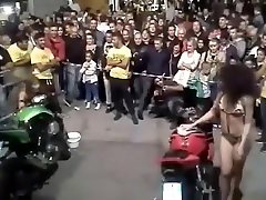 Bike washing competition with sexy babes in swimsuits