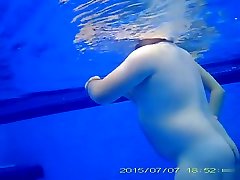 Underwater lnu sex video in the pool at the nudist resort