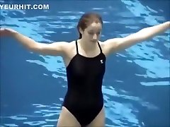 Girls swim in their tight costumes
