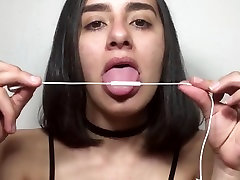 Girl licking a microphone