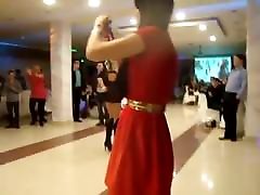 Circassian girl dancing in high heels and short dress