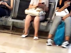 hot milf open legs braces leggings girl in mall