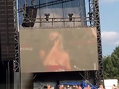 Swedish blonde flashes her tits on stage! caged feet slave Lo