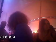 girls dancing under a tent