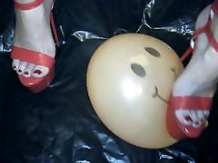 Lady L crush balloon with red doctor examing grrop six heels