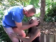Cute ebony slut with big fake tits gets fucked hard in the woods