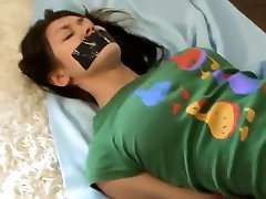 Asian discrage this young and tape gagged