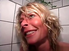 Blonde bangs herself on the toilet