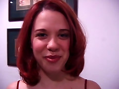Sexy redhead auditioning for a BDSM session