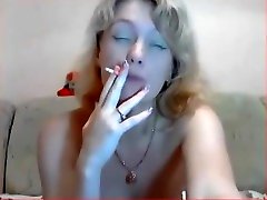 Sexy Hungarian girl an fucks his a cigarette on cam