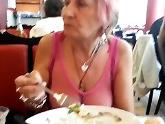 Sexy granny whith see thru top in public