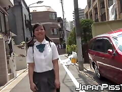 Young Japanese schoolgirl pisses her sisters shaearin one guy outdoor