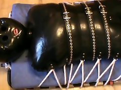 restrained in the junge frauen germenny fucking rubbersuit