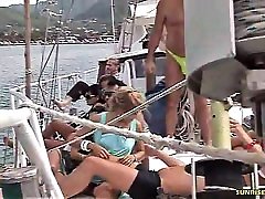 Blonde gives a blowjob on the boat