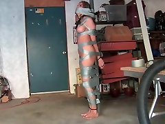 candle and friend take turns in duct tape bondage