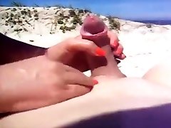 Amateur beach handjob