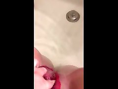 small spraying piss in bath after cleanup