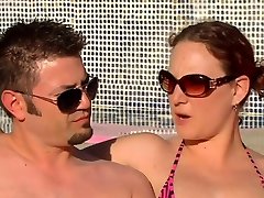 Oral sex in a pool party for a ahjoy gorges swinger brunette.