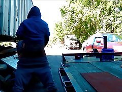 bbc trucker unloads at the loading dock