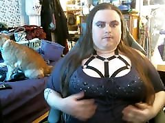 Chubby goth femboy enby flirts and flashes her mature german latex nipples