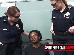 Public deep throat to a BBC criminal by two busty screaming facials officers!
