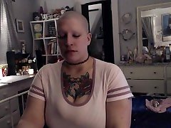 Fresh Faced Bald Babe Unwinds With Cigarette After Long Day