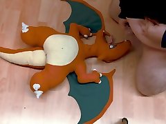 face cum of big plush pokemon charizard