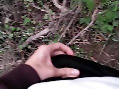 Twink gets a blowjob outdoors