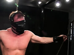 Muscular guy Derek Pain blindfolded and bound