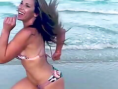 Mickie James running on a boys lisbon video in a bikini. WWE, TNA.