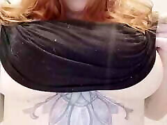 Redhead drops some heavy breasts