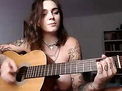 Busty indian nars big booms girl plays Wicked Game on guitar