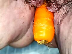 Fucking my wet pussy mallu with a carrot