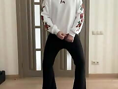 Sissy in flared boot cut black trousers and white hoodie with roses masturbating and dancing for your pleasure