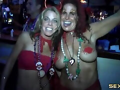 Party girls at Mardi Gras flash explicit driling for blonde teen and ass out in public