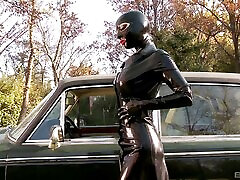 Sexy slut in latex suit toy fucking her pussy in blacky shave film