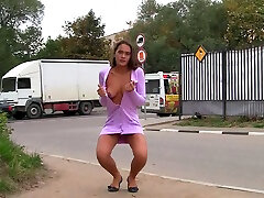 Fine caramel skin Russian teen in purple dress flashes her goodies on the street