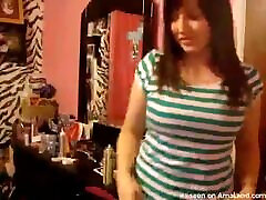 Cute teen stripping her clothes off in her bedroom