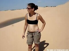 Naughty brunette chick flashing her teen job bbc in desert